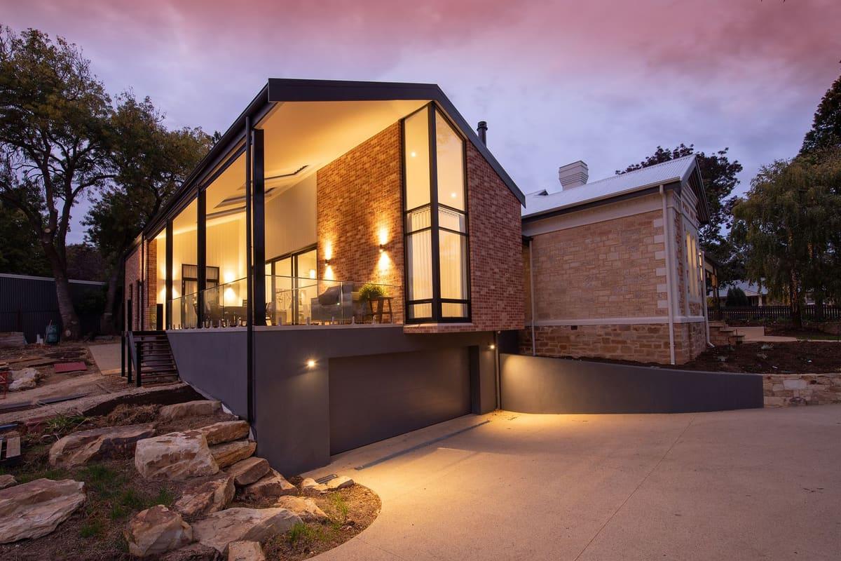 Renovated modern home exterior at dusk