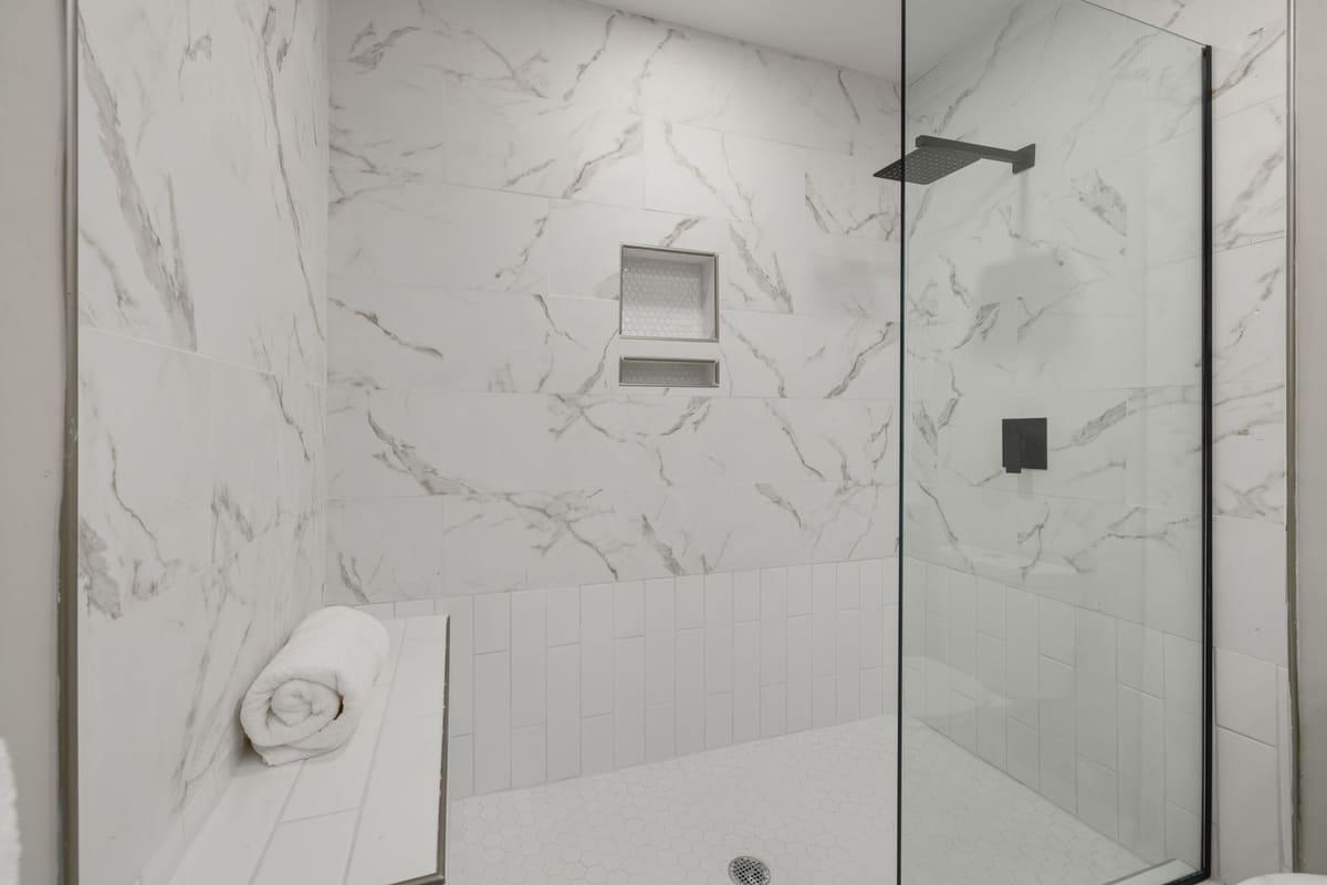 Renovated bathroom with walk-in shower